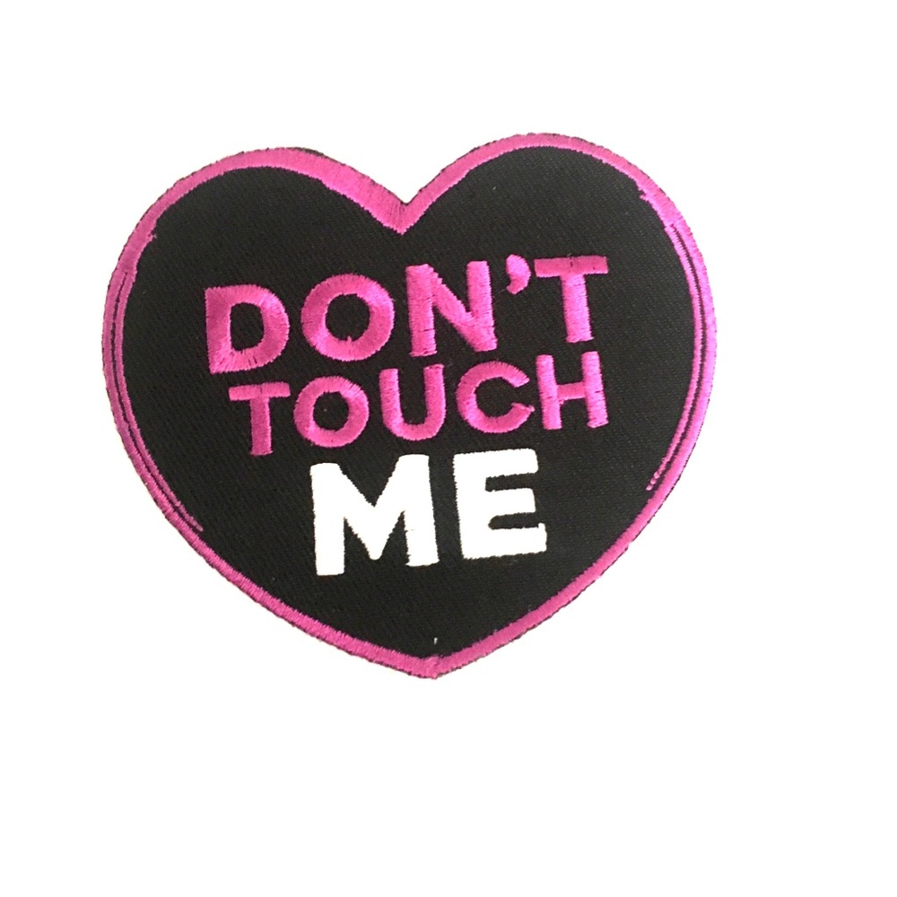 A “Don’t touch me” iron on patch.